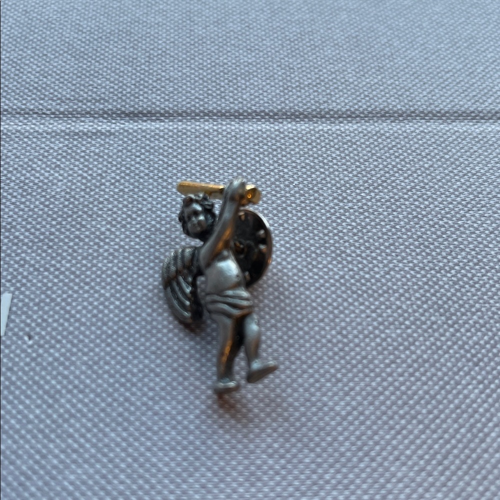 Ballou Vintage guardian angel in silver tone holding a gold tone sword.